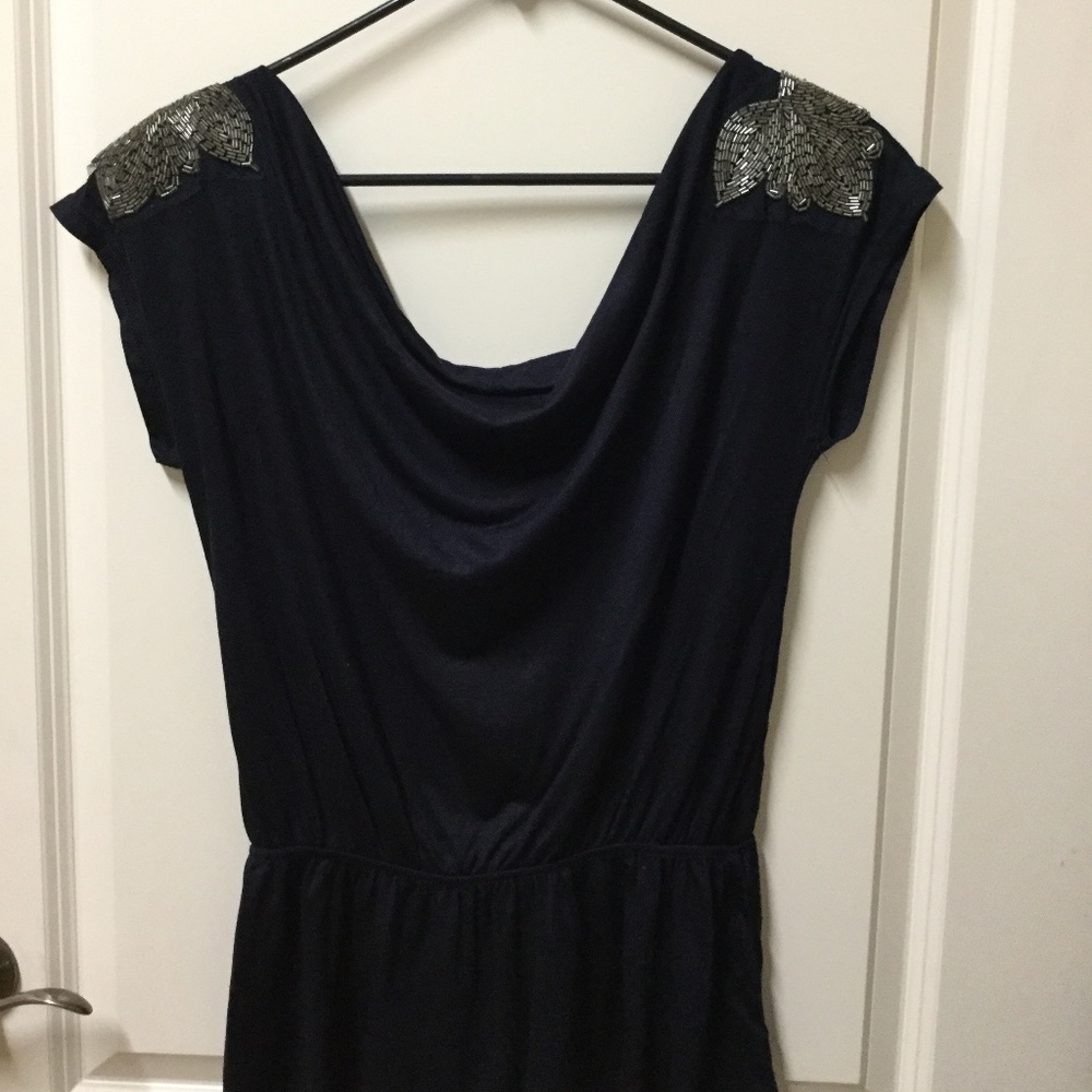 Beaded cotton peplum top